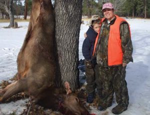 Austin-and-Joanna-Hansen-with-her-first-elk