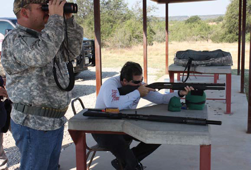 Bill-Davison-shoots-slugs-at-100-yards-while-Mike-Moore-spots