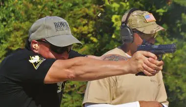 Instructor-David-Bowie-demonstrates-proper-hand-technique-for-maximum-control-of-the-pistol-during-rapid-fire