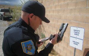 Officer-builds-good-habits-while-removing-source-of-ammunition-during-unloading-procedure