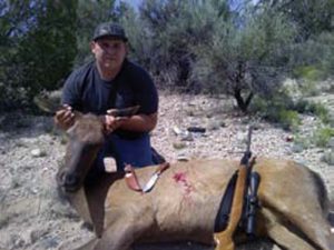 Stephen-Hackleman-just-before-field-dressing-an-elk