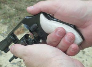 Students-learn-how-to-properly-index-a-partial-reload,-a-critical-revolver-skill-when-pressed-for-time-or-low-on-ammo