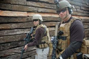Suzanne-Consentino-(left)-wears-ACH-helmet-and-BCM-03-Split-Front-Chest-rig-over-an-Eagle-Plate-Carrier
