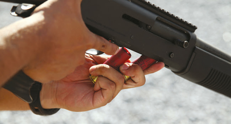 Marine-loads-multiple-rounds-into-M1014-shotgun