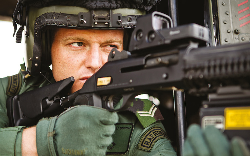 RAF-Regiment-sniper-assigned-to-heliborne-sniper-team-for-London-Olympics-sights-through-EOTech-sight-mounted-on-his-L128A1